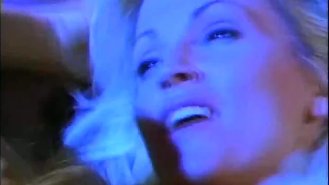 Moaning Blonde Gets Banged Doggy Style Amidst Retro Orgy Action