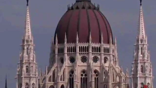 Seductive Brunette Enjoys Sultry Skin-on-Skin Stroll Indoors