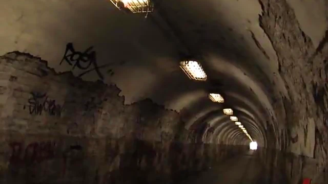 Seductive Brunette Enjoys Sultry Skin-on-Skin Stroll Indoors