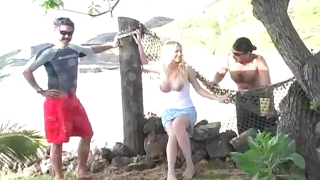 Sizzling Blonde Sunbathing Topless by the Ocean Waves