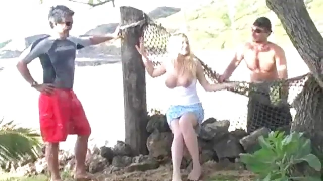 Sizzling Blonde Sunbathing Topless by the Ocean Waves