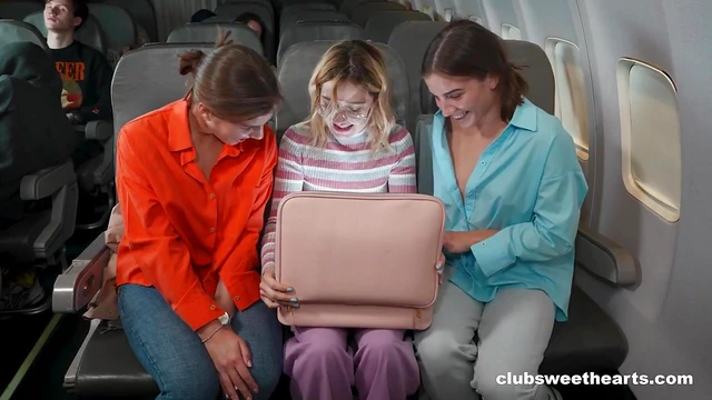 Excited Russian Lesbians Drop Panties for Steamy Plane Sex Scene