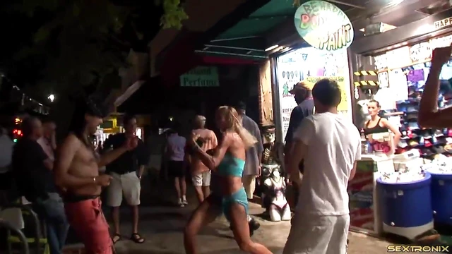 Body-Painted Beauties Bare-Breasted Stroll Seduces Public Eyes