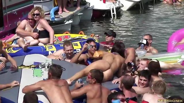 Lesbian Amateurs Play by the Lake While Guys Watch Excitedly Nearby