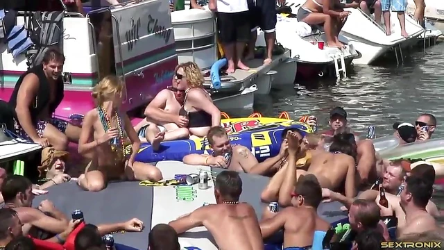 Lesbian Amateurs Play by the Lake While Guys Watch Excitedly Nearby