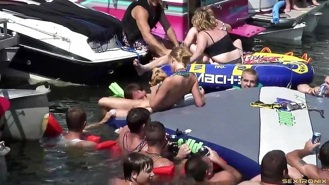 Lesbian Amateurs Play by the Lake While Guys Watch Excitedly Nearby