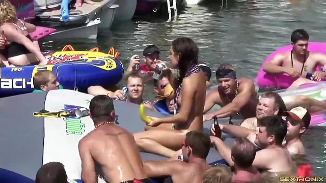 Lesbian Amateurs Play by the Lake While Guys Watch Excitedly Nearby