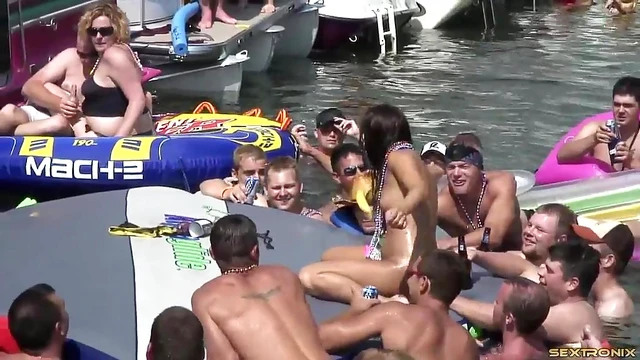 Lesbian Amateurs Play by the Lake While Guys Watch Excitedly Nearby