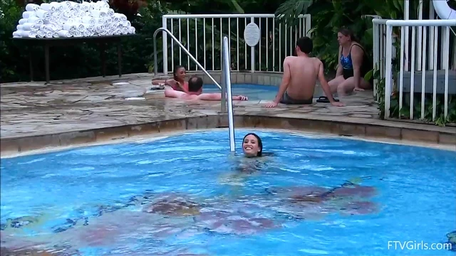Skimpy Swimsuit Girls Take Sultry Public Poolside Dip Together