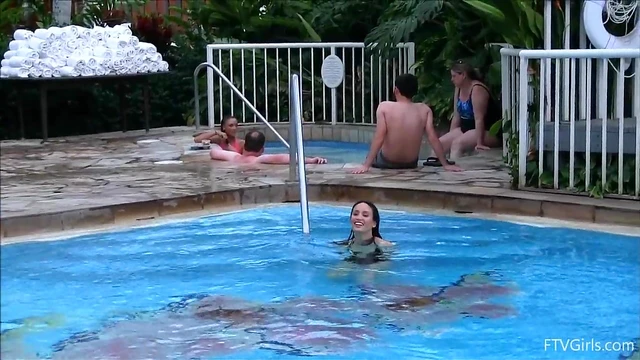 Skimpy Swimsuit Girls Take Sultry Public Poolside Dip Together
