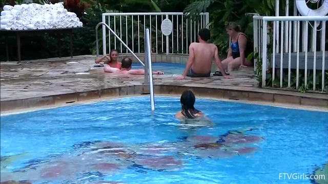 Skimpy Swimsuit Girls Take Sultry Public Poolside Dip Together