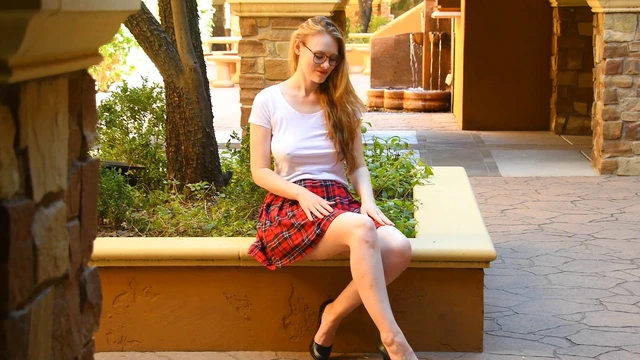 Roni Teases Under Miniskirt While Wearing Glasses: A Seductive Showdown