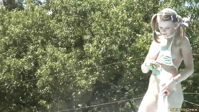 Cowgirl With Pigtails Shows Off Nude Body in Sexy Outdoor Photoshoot