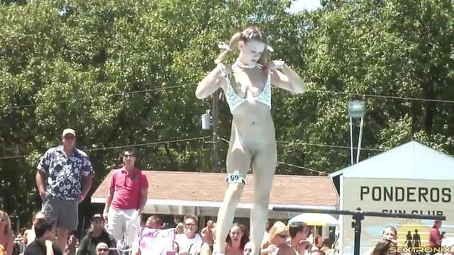 Cowgirl With Pigtails Shows Off Nude Body in Sexy Outdoor Photoshoot