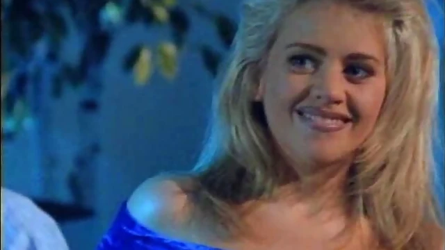 Blonde Tempts Seductive Brunette into Steamy Passionate Affair