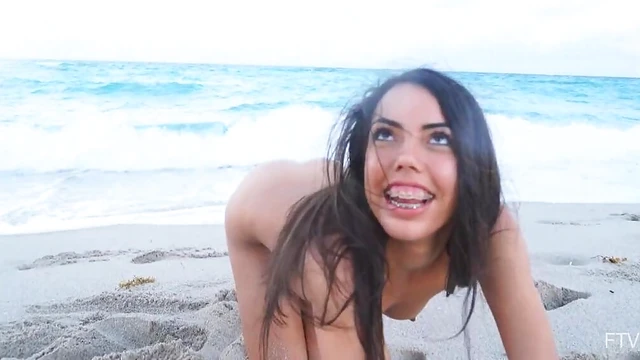 Rachel's Natural Tits Glisten As She Dips Naked into the Sea Waves