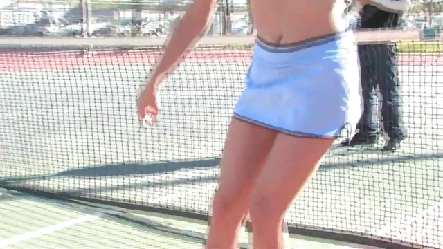 Naughty Tennis Player Shows Off Her Body On Busy Court