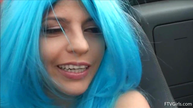 Seductive Stacey in Blue Wig Strips Teasingly By The Poolside