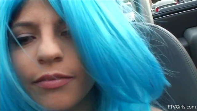 Seductive Stacey in Blue Wig Strips Teasingly By The Poolside