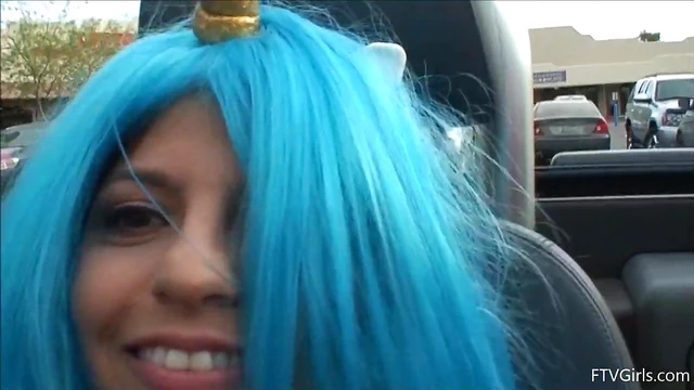 Seductive Stacey in Blue Wig Strips Teasingly By The Poolside