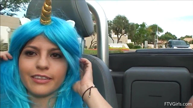 Seductive Stacey in Blue Wig Strips Teasingly By The Poolside