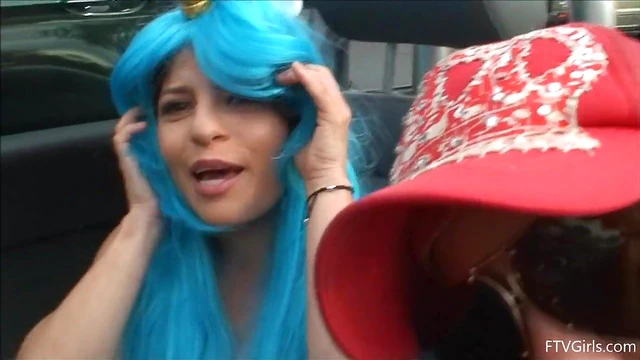 Seductive Stacey in Blue Wig Strips Teasingly By The Poolside