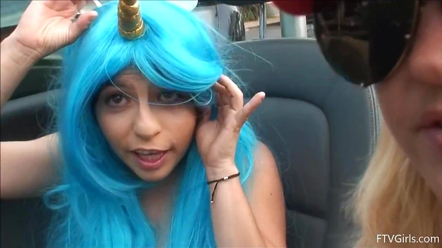 Seductive Stacey in Blue Wig Strips Teasingly By The Poolside