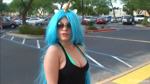 Seductive Stacey in Blue Wig Strips Teasingly By The Poolside