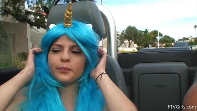 Seductive Stacey in Blue Wig Strips Teasingly By The Poolside