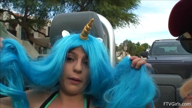 Seductive Stacey in Blue Wig Strips Teasingly By The Poolside