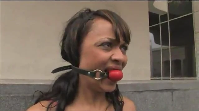 Cuffed Submissive Brunette Wanders in Shackles Arousing Curiosity All Day Long