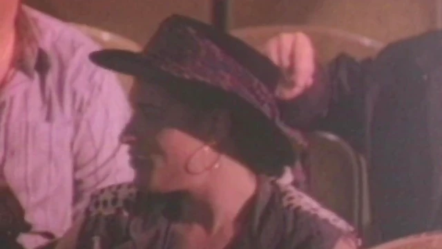 Elegant Lesbians Seduce Each Other While Crowd Watches Passionately