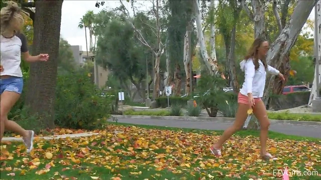 Hot Lesbians in Shorts Share Passionate Kisses During Public Rendezvous