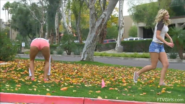 Hot Lesbians in Shorts Share Passionate Kisses During Public Rendezvous