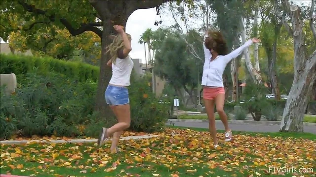 Hot Lesbians in Shorts Share Passionate Kisses During Public Rendezvous