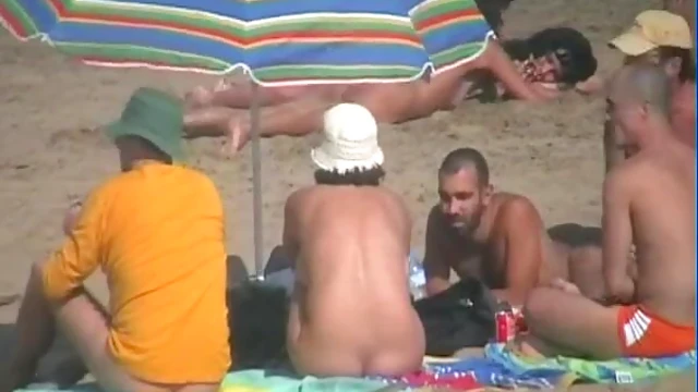 Curious Nudists Caught Sunbathing Naked at Tropical Island Beach