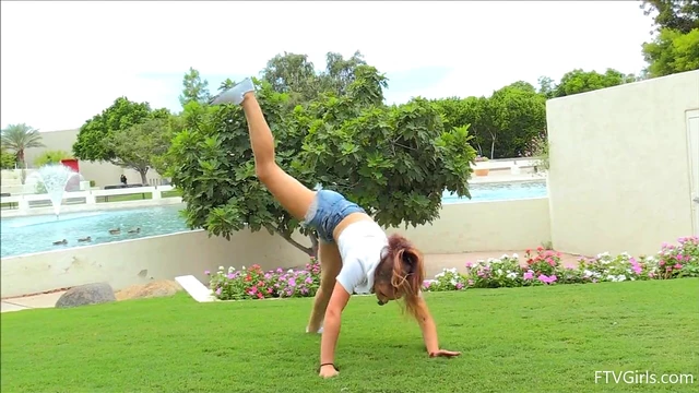 Flexible Brunette Model Stoney Shows Off Her Flexibility Outdoors Publicly