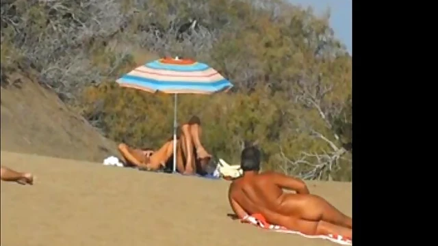 Bold Public Pleasure: Daring Masturbation Showcases Her Sensual Side On Beach