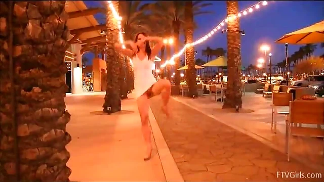 Melody Flashes Her Shaved Pussy Teasingly in Public