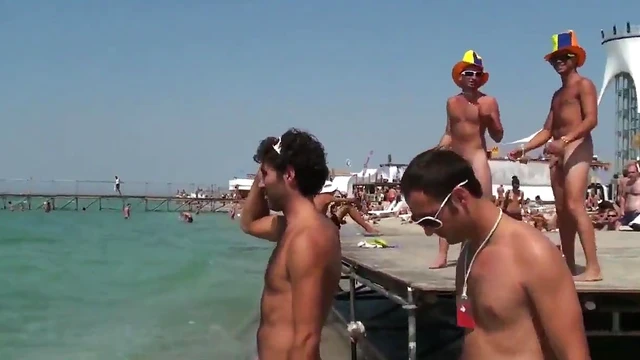 Young Girl Enjoys Beach Party With Sexy Guys In The Sunlight