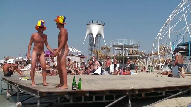 Young Girl Enjoys Beach Party With Sexy Guys In The Sunlight