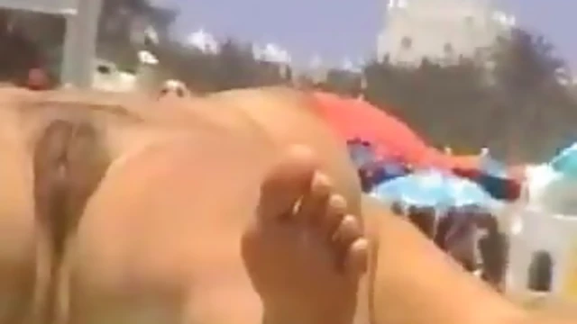 Beachside Bliss: Homemade Video Captures Pussy's Sultry Sunbathing Moments