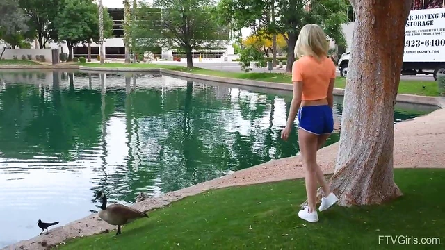 Outdoor Temptation: Flexible Blonde Kiara Teasingly Spreads Her Legs