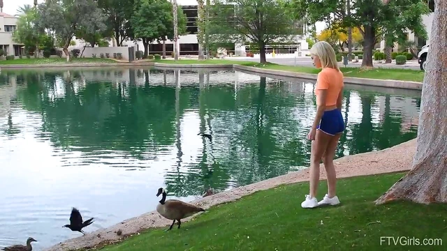 Outdoor Temptation: Flexible Blonde Kiara Teasingly Spreads Her Legs