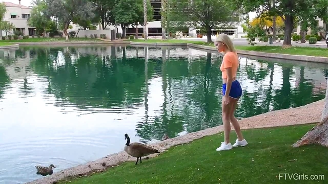 Outdoor Temptation: Flexible Blonde Kiara Teasingly Spreads Her Legs