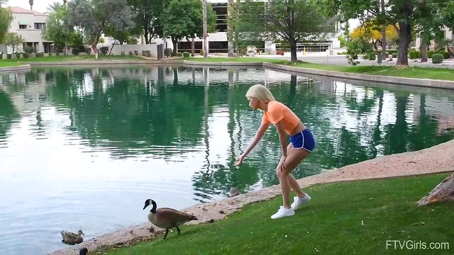 Outdoor Temptation: Flexible Blonde Kiara Teasingly Spreads Her Legs