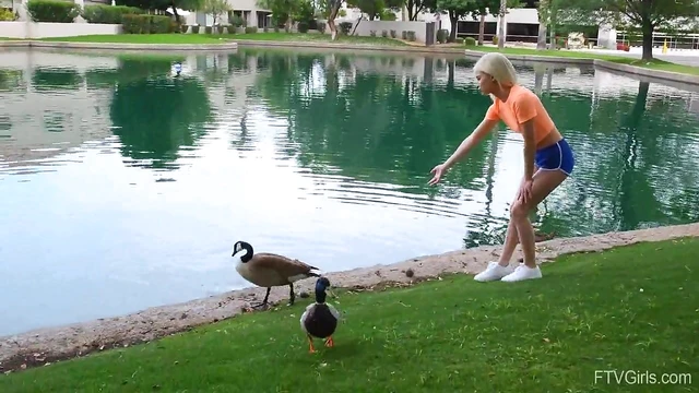 Outdoor Temptation: Flexible Blonde Kiara Teasingly Spreads Her Legs