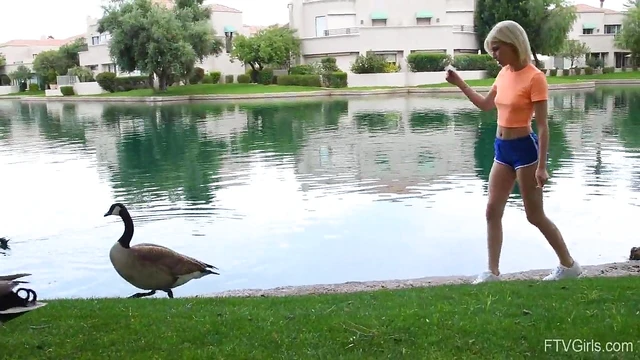 Outdoor Temptation: Flexible Blonde Kiara Teasingly Spreads Her Legs