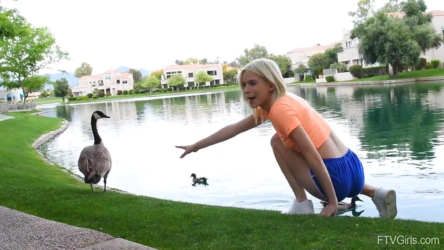 Outdoor Temptation: Flexible Blonde Kiara Teasingly Spreads Her Legs