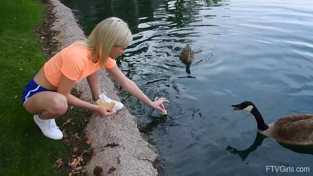 Outdoor Temptation: Flexible Blonde Kiara Teasingly Spreads Her Legs